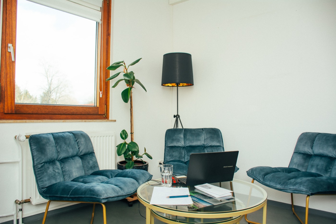 Furnished lounge with armchairs